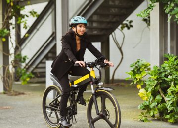 Woman riding an electric bicycle